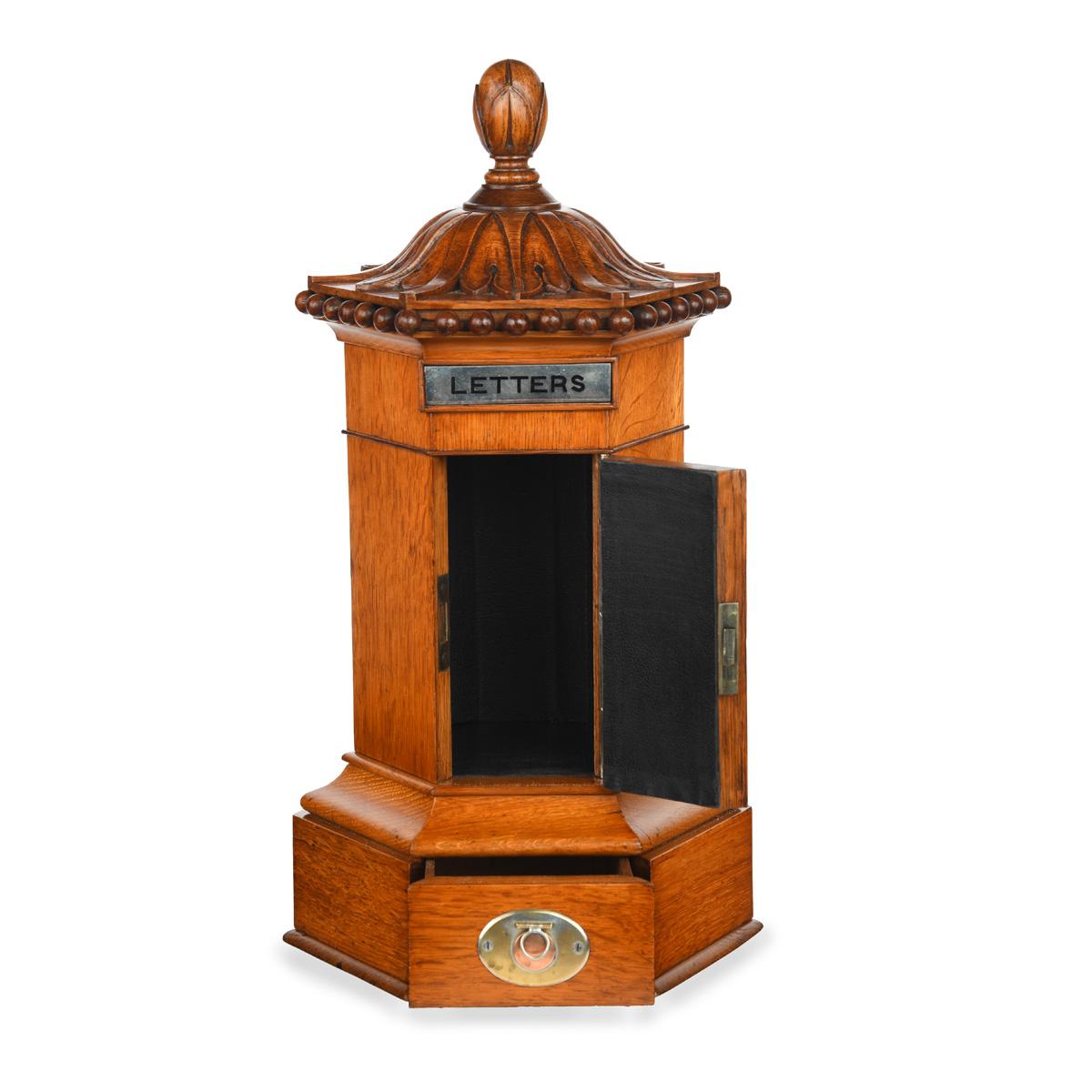 A Victorian English oak 6 sided Country house letter box, with single draw to the base and silver plated handle.
English  Circa 1865
Designed as a six-sided pedestal box, it was intended for use in an affluent country house, where the proper