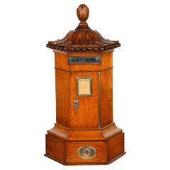 A Victorian English oak 6 sided Country house letter box