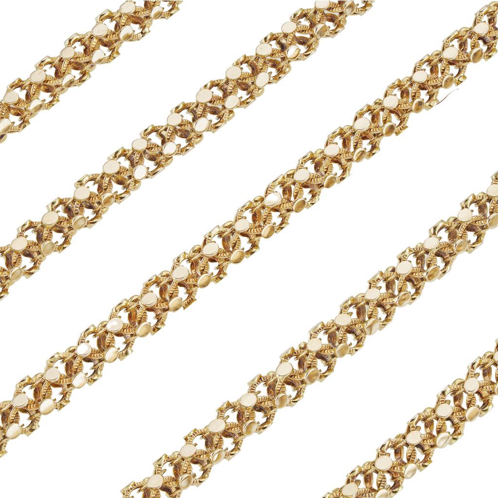 A Victorian fancy open-mesh yellow gold chain, tested as 14ct gold, circa 1890, measuring approximately 150cm in length and 4mm in width, gross weight 49.3 grams.

This antique chain is in fine condition for its age. Unmarked, tested as 14ct
