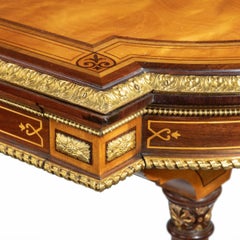 A Victorian fine satinwood ladies’ writing table attributed to Holland and Sons