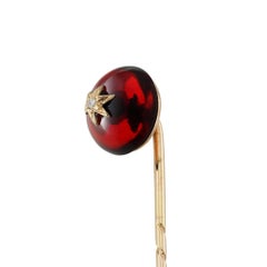 A Victorian garnet and diamond stickpin
