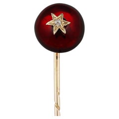 A Victorian garnet and diamond stickpin