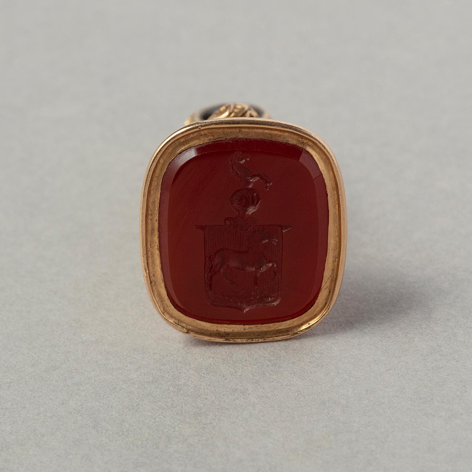 A Victorian Gold and Carnelian Seal with a Horse Crest 1
