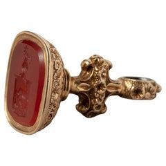 A Victorian Gold and Carnelian Seal with a Horse Crest