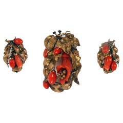 Antique A Victorian gold and coral set from Sciacca, brooch and earrings. England, 1880.