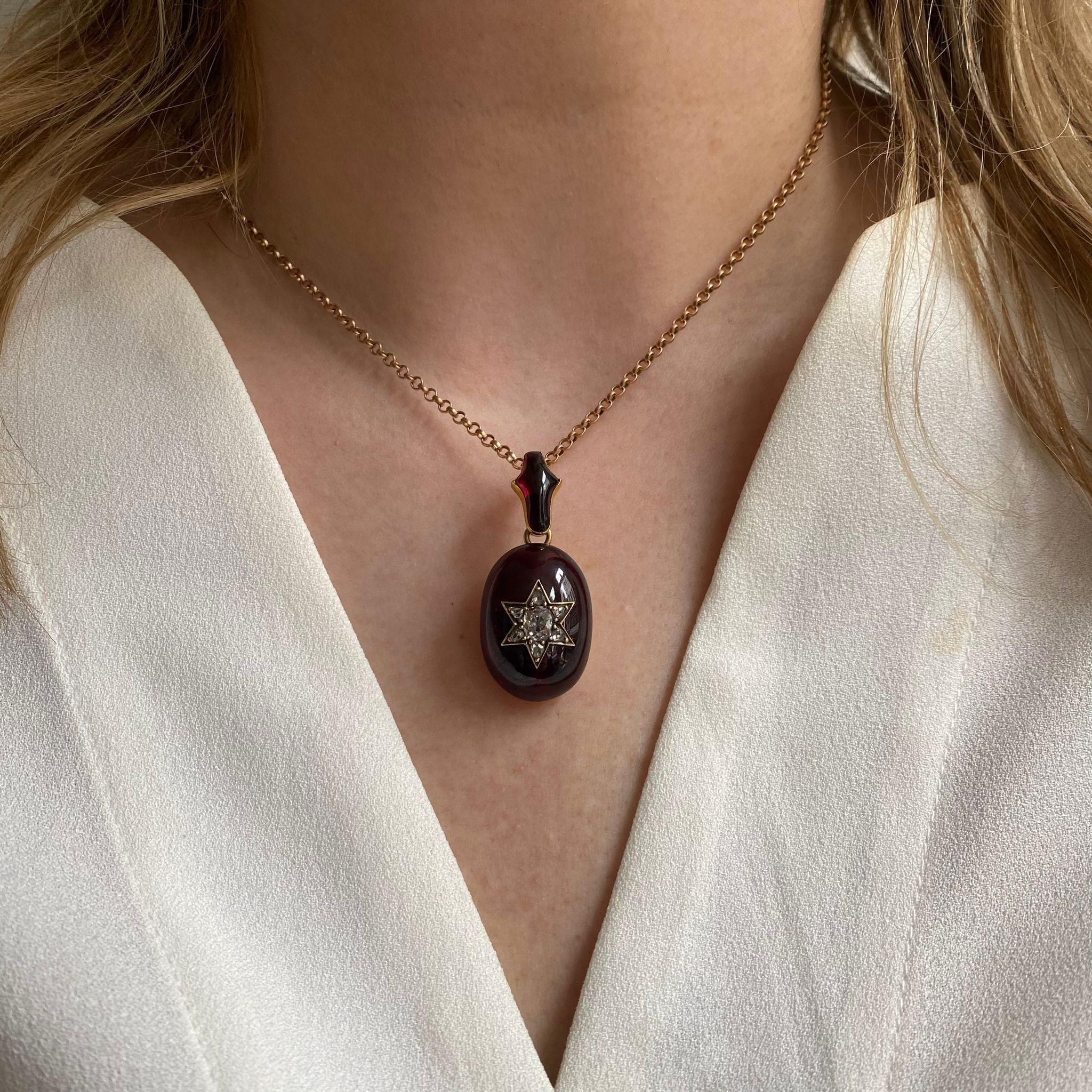 A Victorian Gold and Garnet Pendant with a Diamond Star For Sale 2