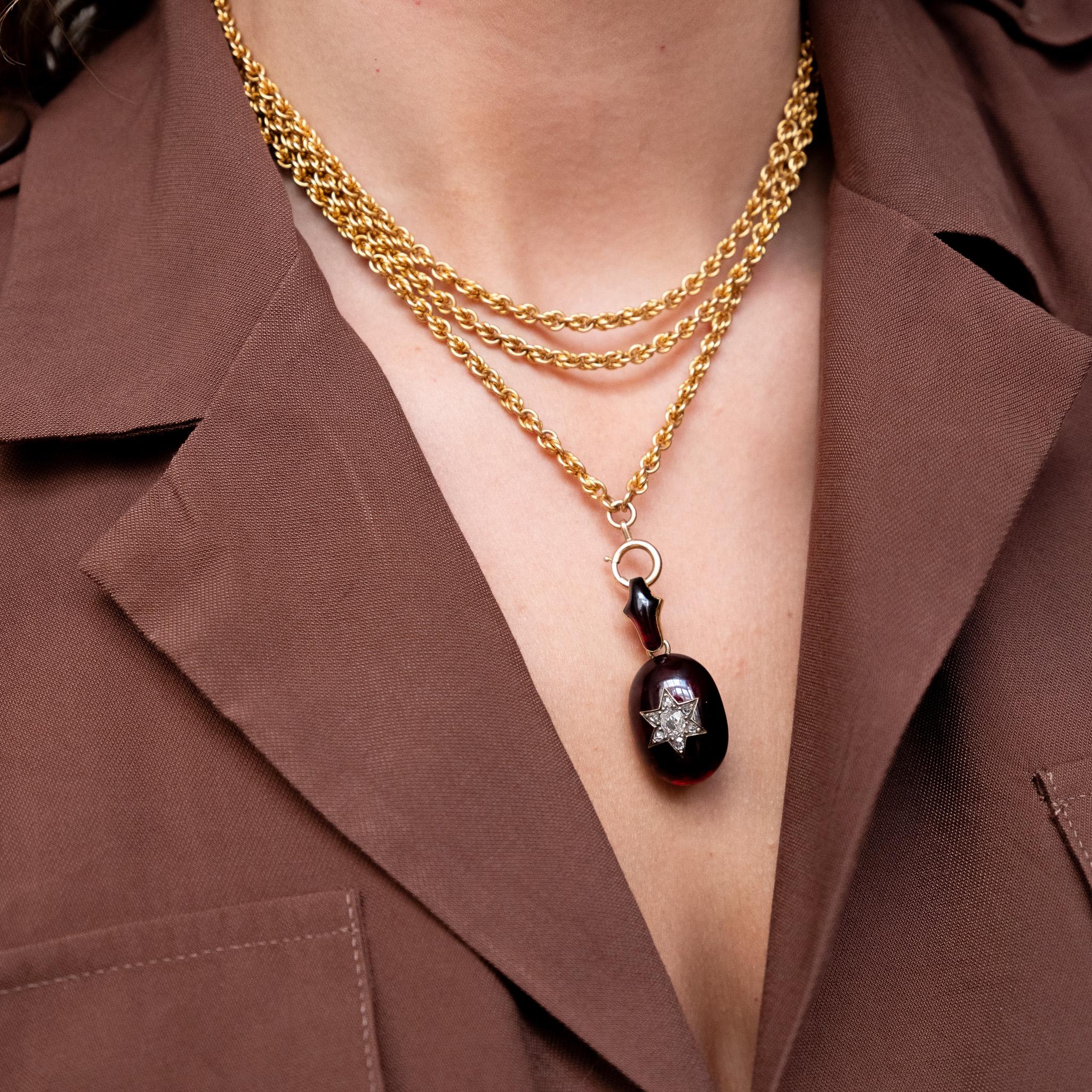 A Victorian Gold and Garnet Pendant with a Diamond Star For Sale 3
