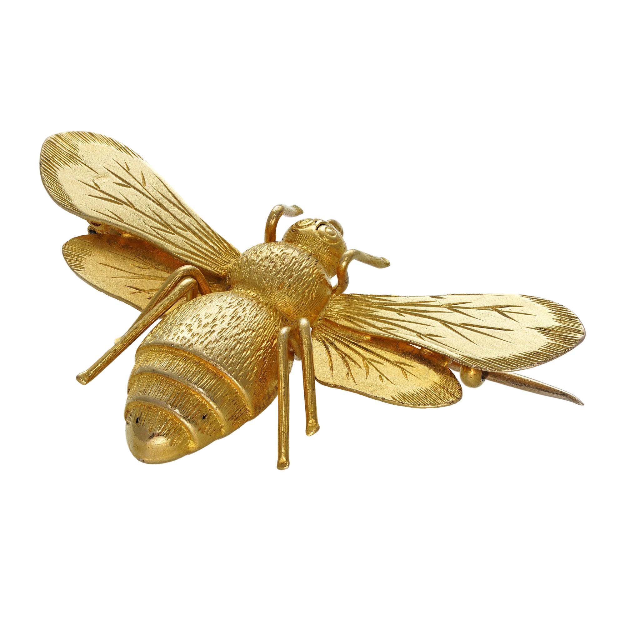 A Victorian gold bee brooch, the realistically designed bee, with textured detail to the body and finely engraved wings, all made in yellow gold hallmarked 15ct, circa 1880, measuring approximately 4.1 x 2.2cm, gross weight 3.2 grams, 

Victorian