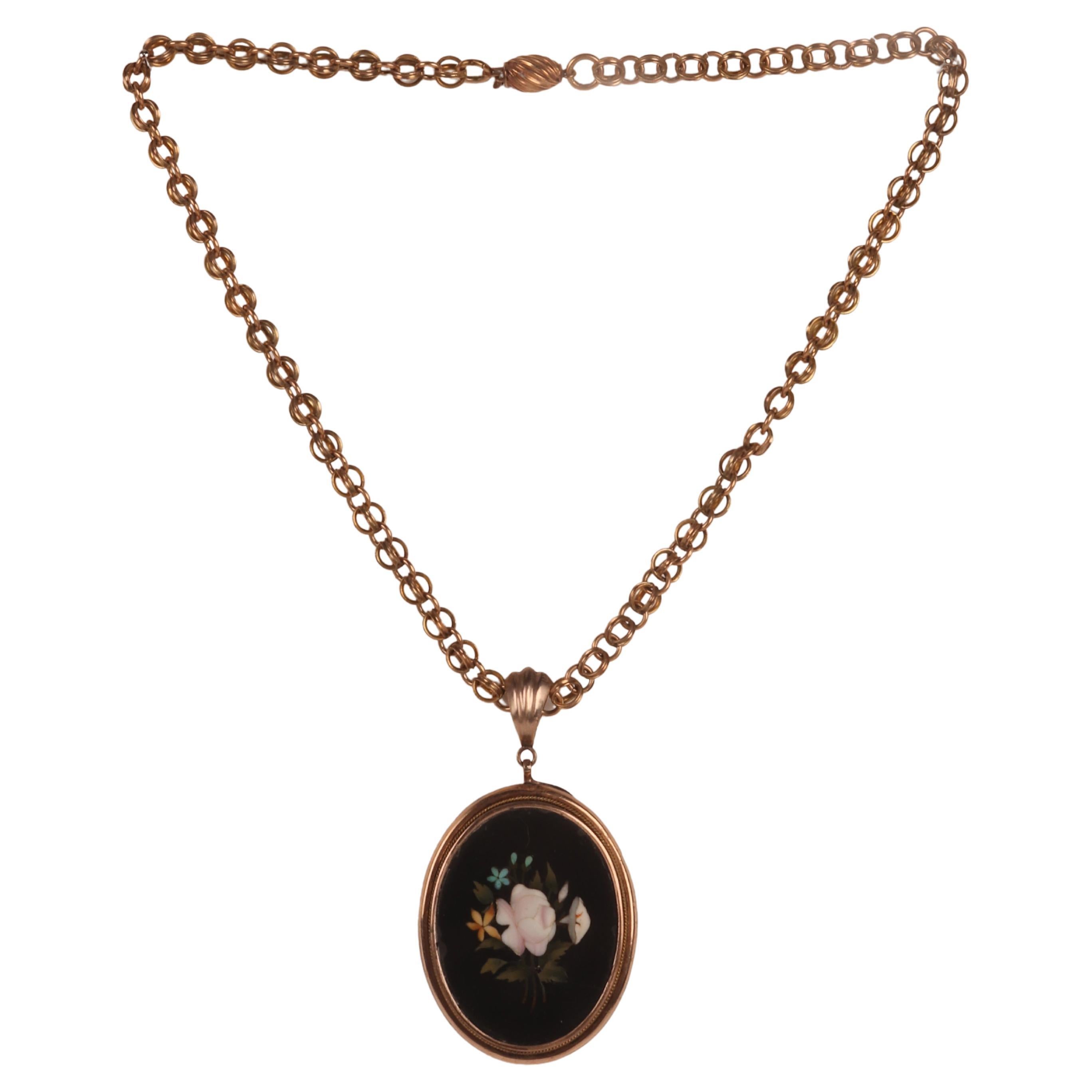 A Victorian gold necklace with a pietradura medallion pendant. England, 1860. For Sale