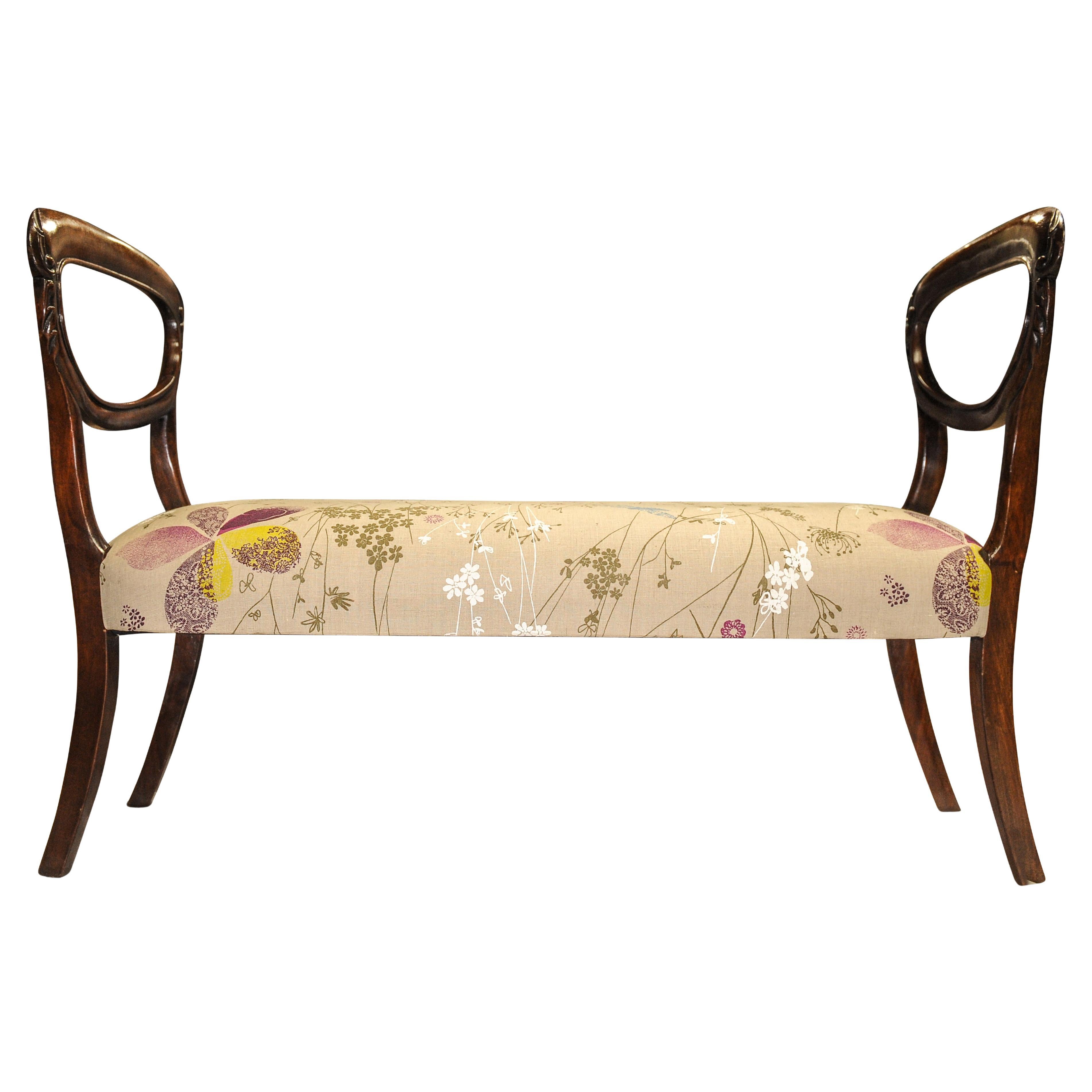 A Victorian Mahogany Balloon Back Window Seat With Floral Upholstery