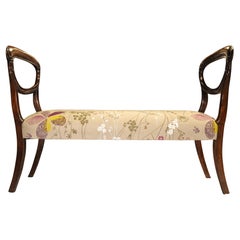 A Victorian Mahogany Balloon Back Window Seat With Floral Upholstery