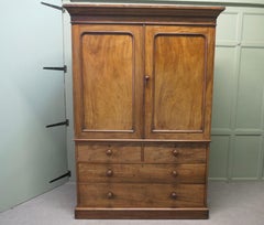 A Victorian Mahogany Linen Press, by Heal’s This is an appealing piece