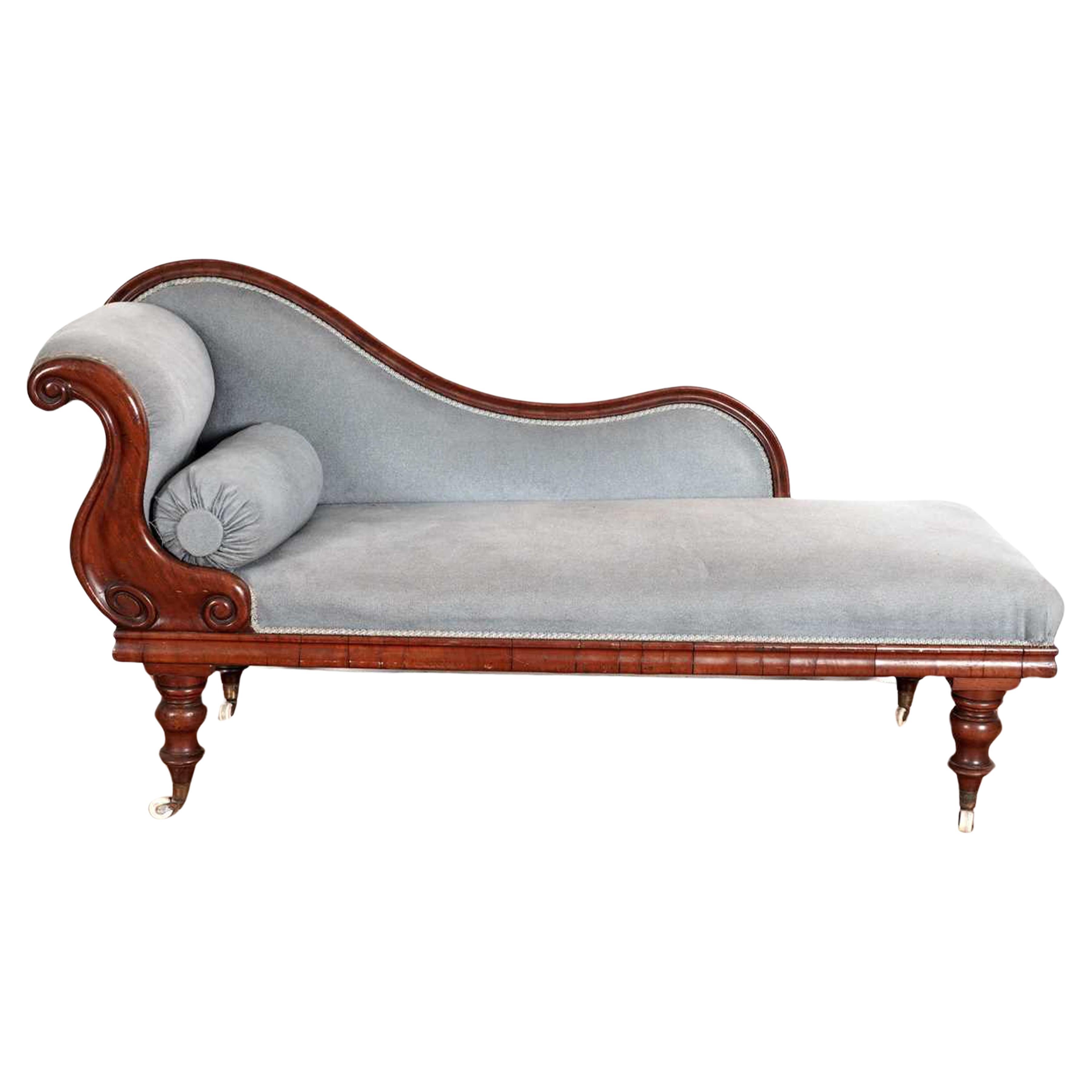 British A Victorian Mahogany Swan Back Chaise Longue Upholstered in a Blue Velvet Fabric For Sale