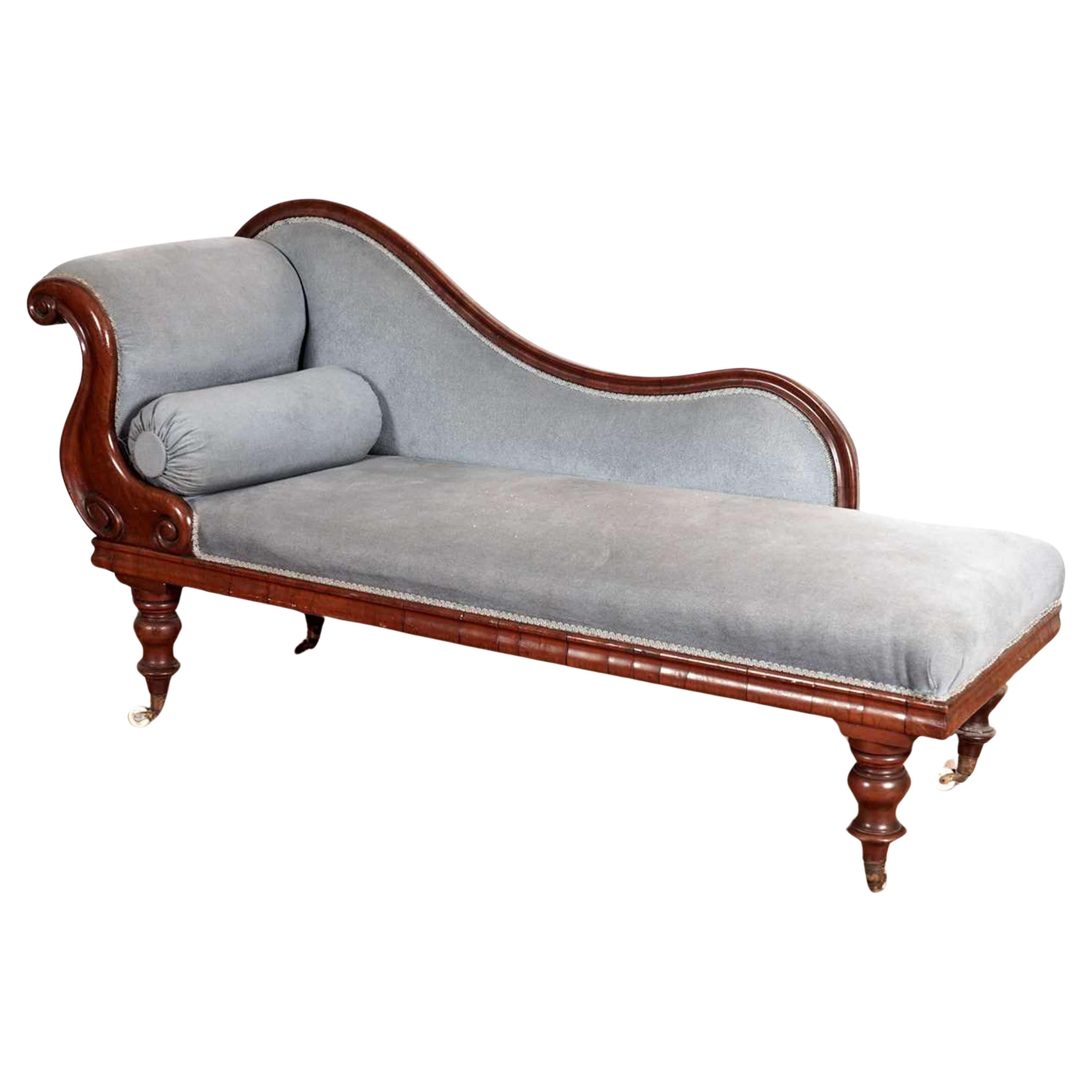 A Victorian Mahogany Swan Back Chaise Longue Upholstered in a Blue Velvet Fabric For Sale