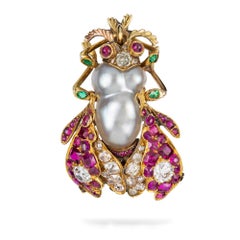 A Victorian Natural Pearl Ruby And Diamond Bug Brooch