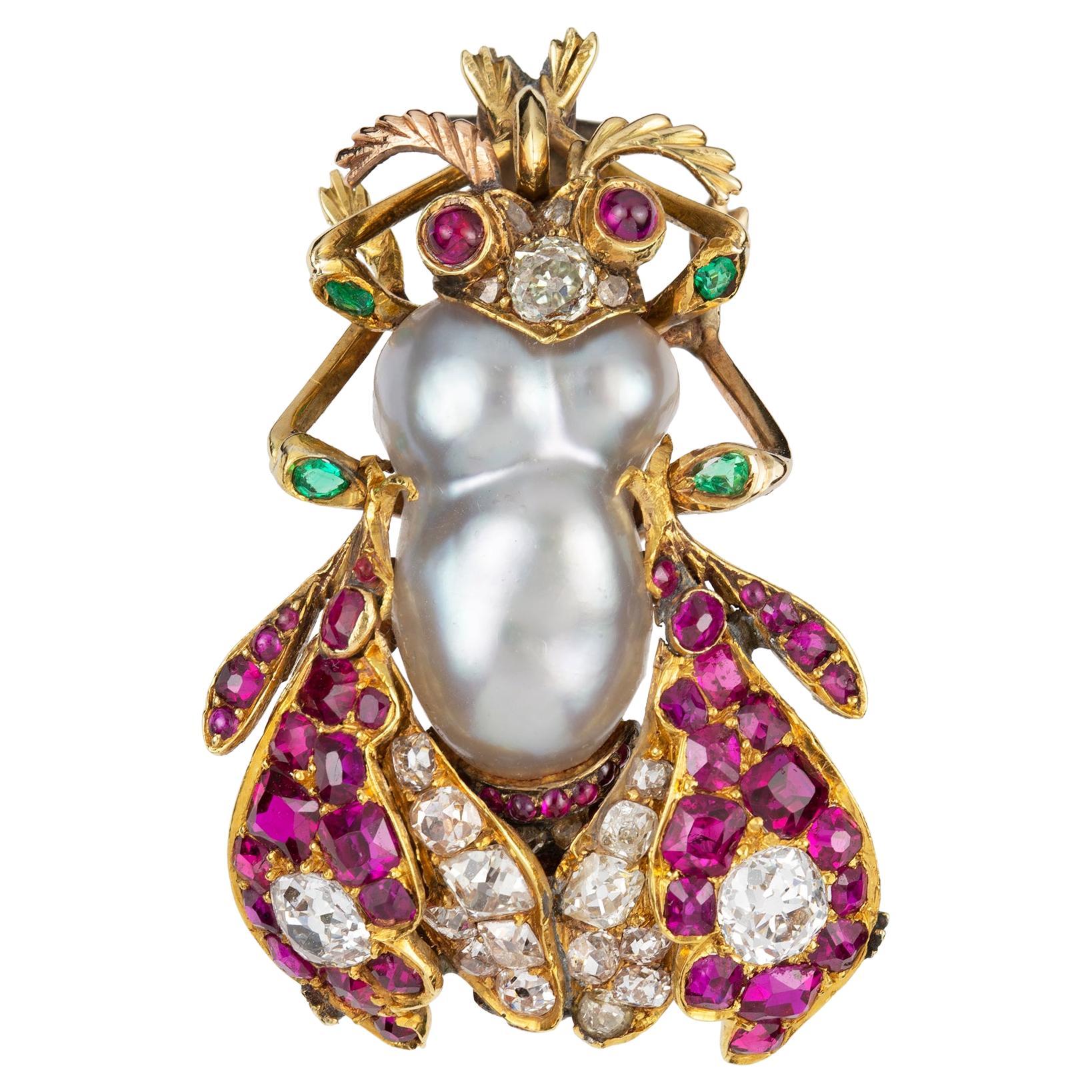 Broche victoriano de perlas naturales, rubíes y diamantes