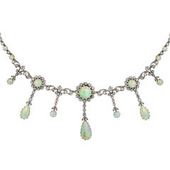 A Victorian Opal And Diamond Necklace By Hancock & Co