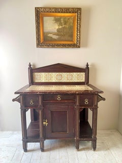 A Victorian Painted And Tiled Aesthetic Movement Washstand