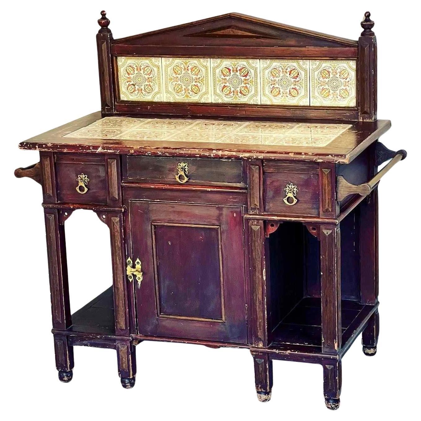 A Victorian Painted And Tiled Aesthetic Movement Washstand