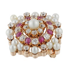 Broche victoriano de perlas, diamantes y rubíes