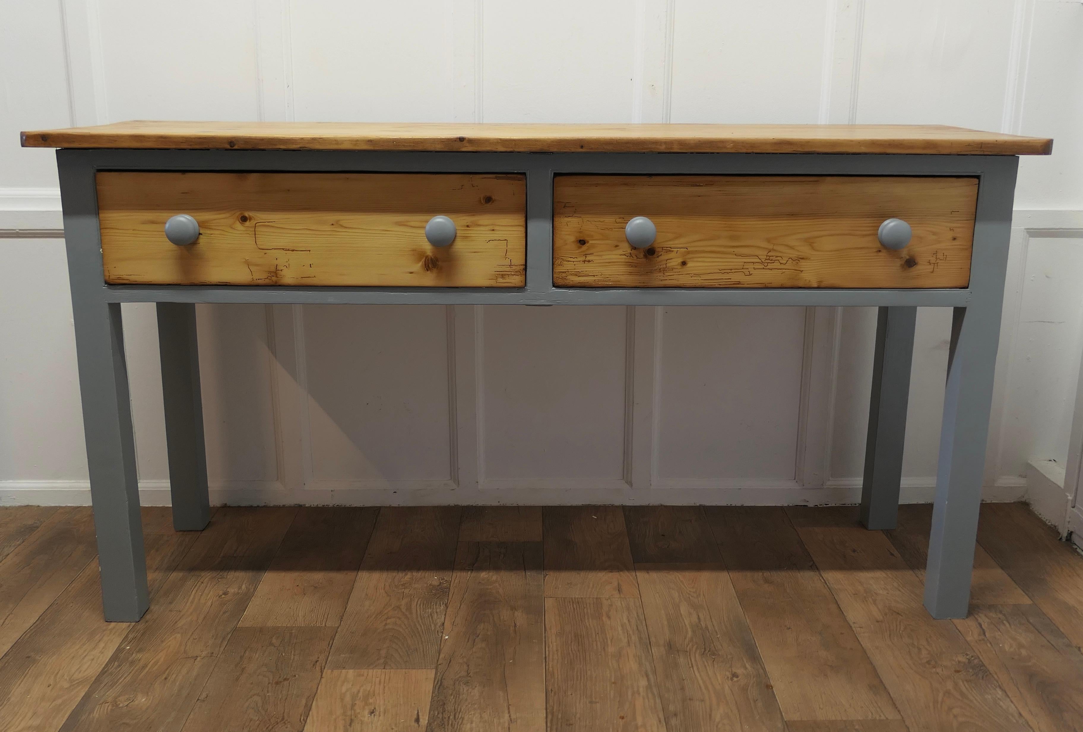 A Victorian Pine Kitchen Dresser 

The dresser base has a thick solid pine top, it stands on square legs and there are two deep heavy pine drawers with turned knobs
The dresser has been fully restored and given a bright new look by having the legs