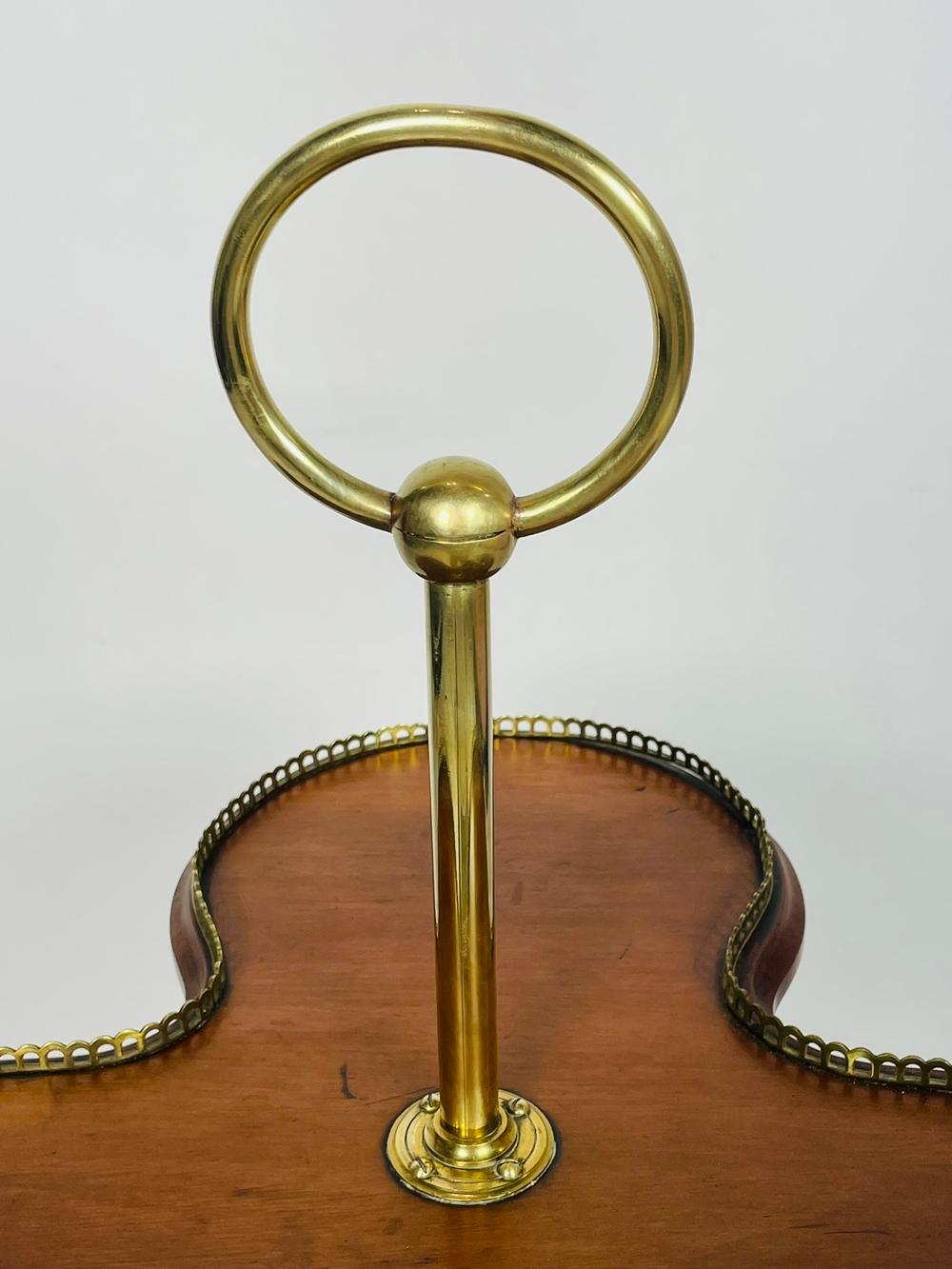 A Victorian Revolving Occasional Table in Brass & Mahogany. 4