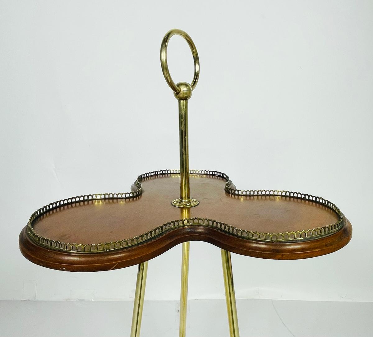 A Victorian Revolving Occasional Table in Brass & Mahogany. 5