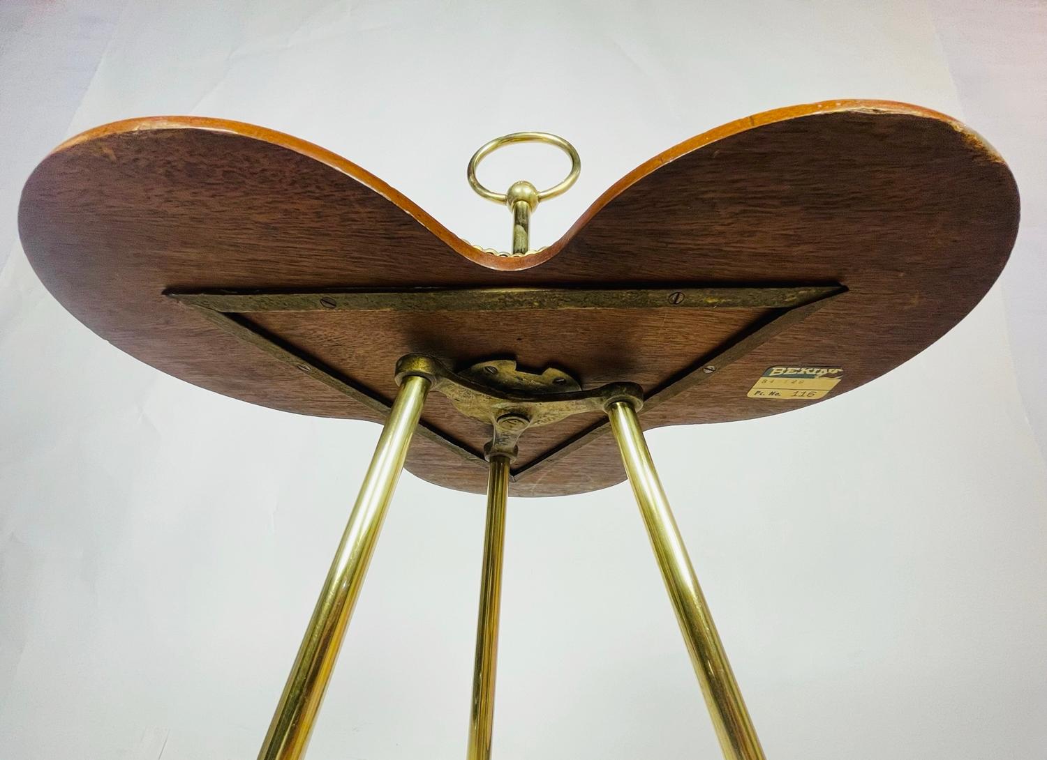 A Victorian Revolving Occasional Table in Brass & Mahogany. 1