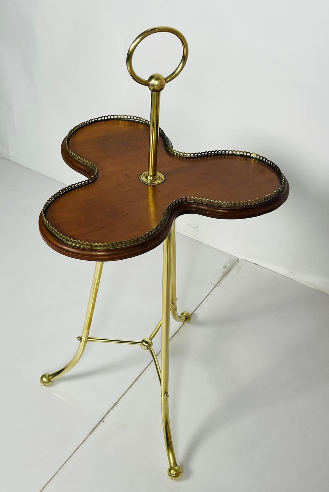 A Victorian Revolving Occasional Table in Brass & Mahogany. 2