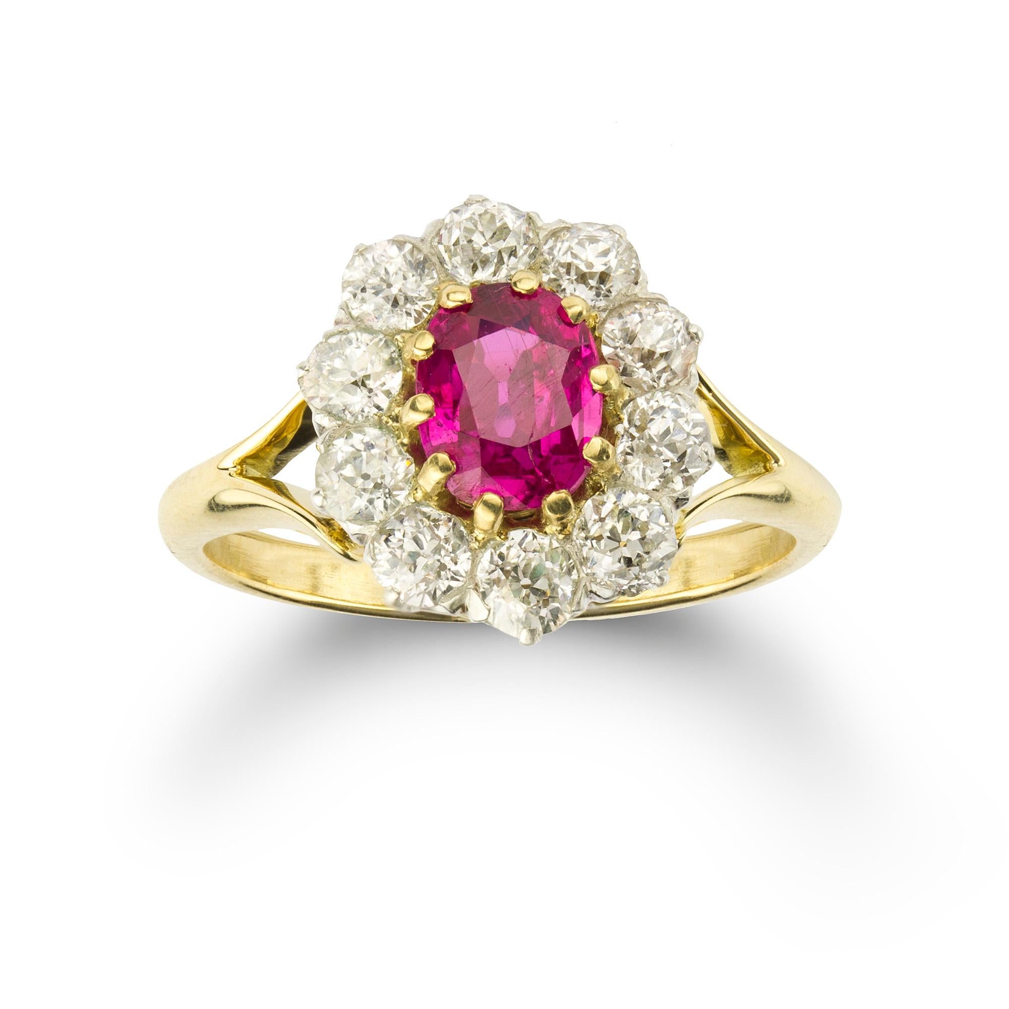 A Victorian ruby and diamond cluster ring/bracelet, the oval faceted ruby weighing 0.92 carats, accompanied by GCS Report stating to be of Burmese origin with no indication of heating, surrounded by ten old brilliant-cut diamonds estimated to weigh