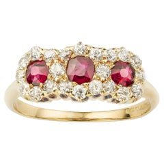 A Ruby And Diamond Triple Cluster Ring By Tiffany & Co