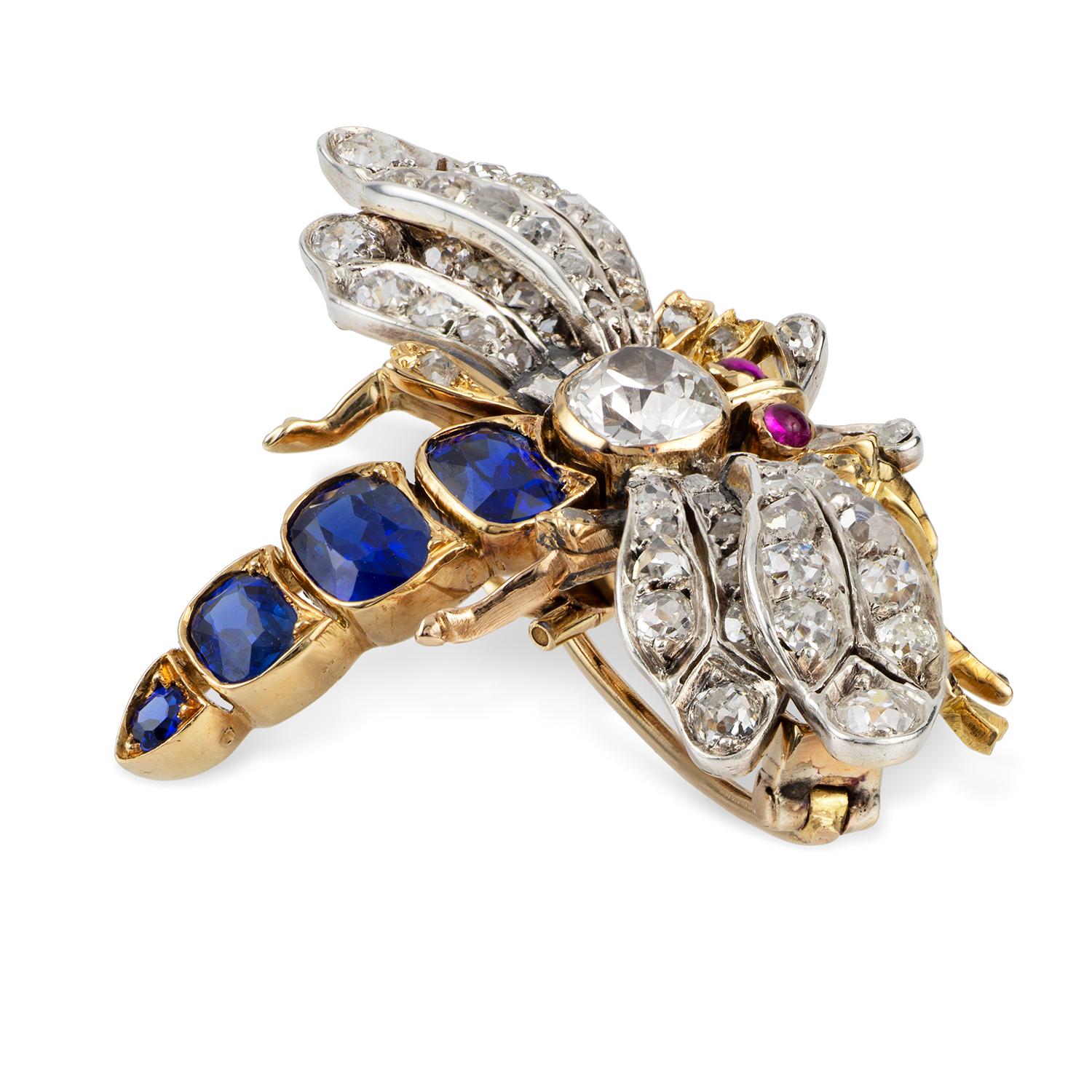 A Victorian sapphire and diamond bee brooch, the thorax set with an old-cut diamond estimated to weigh 0.8 carats, the abdomen set with four sapphires, estimated to weigh a total of 2 carats accompanied by Gem & Pearl Lab Report 17165 stating to be