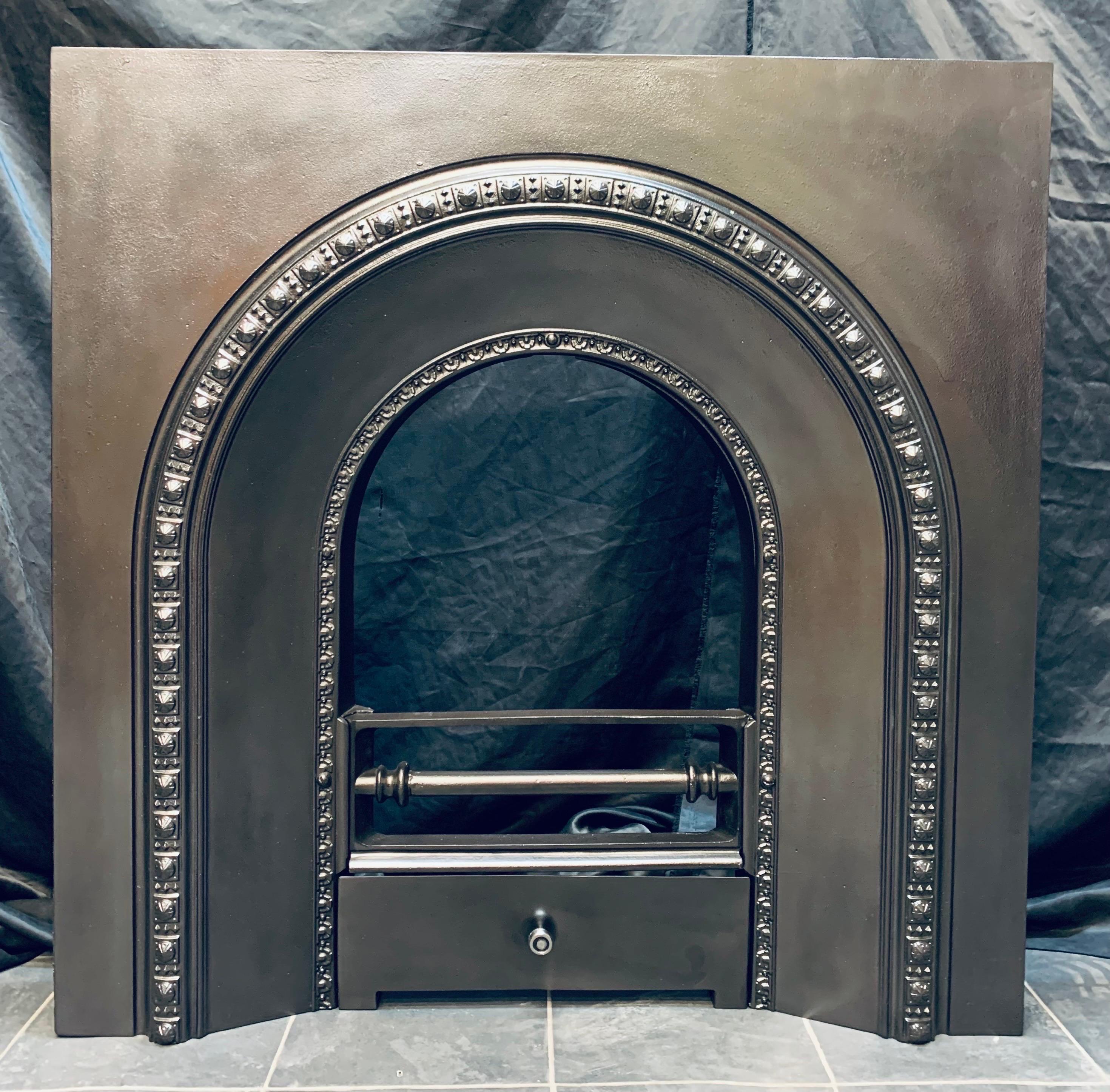 A fully restored Victorian Scottish Carron of Falkirk cast iron arched fireplace insert. A generous sized back plate with attractive cast detail around the opening. The reg stamp to the reverse dates this to 1870. 

Falkirk, Scotland 1870c.
