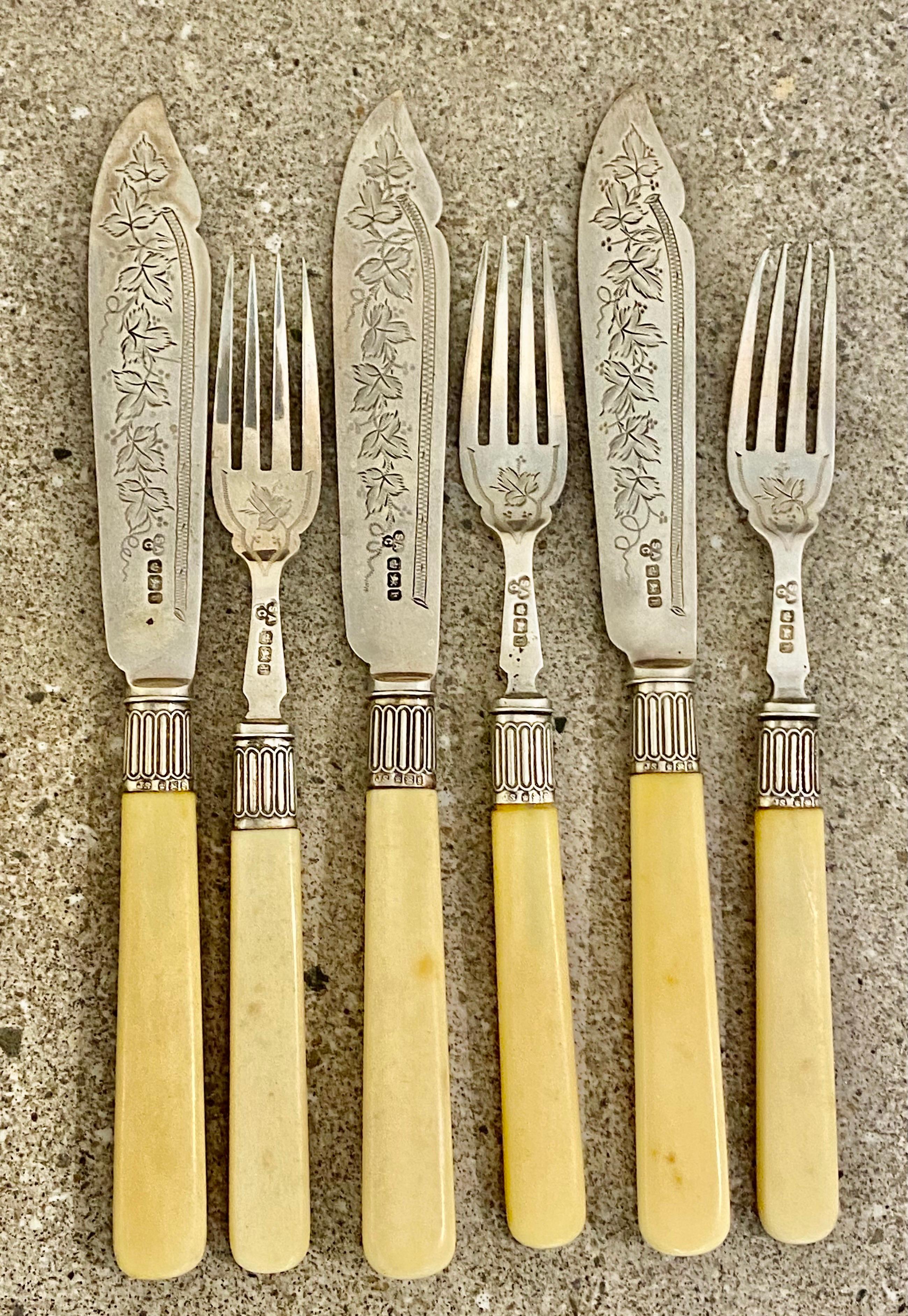 silver fish knives and forks with bone handles