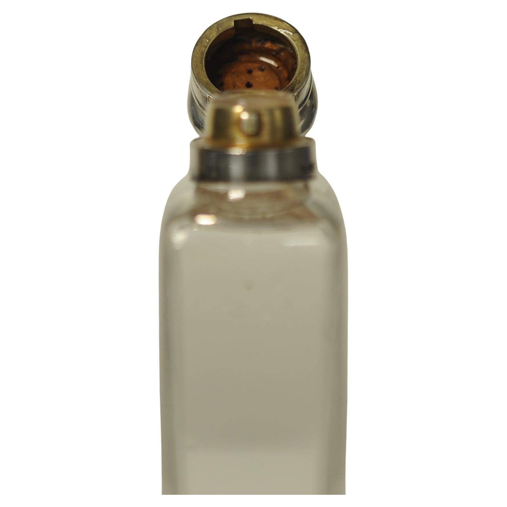 A Victorian Sterling Silver and Glass Altar/Communion Flask by James Dixon & Sons Hallmark 1871 Sheffield 

By 19th Century Silversmith J.D & S into a shield (James Dixon & Sons
Engraved M.J.S to lid 
Glass Is Etched With A Cross 

Business