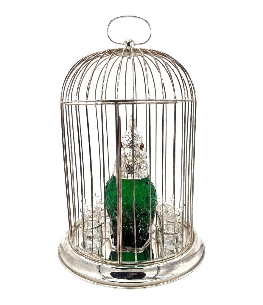A Victorian style green glass, cockatoo decanter in silver plated cage For Sale 1