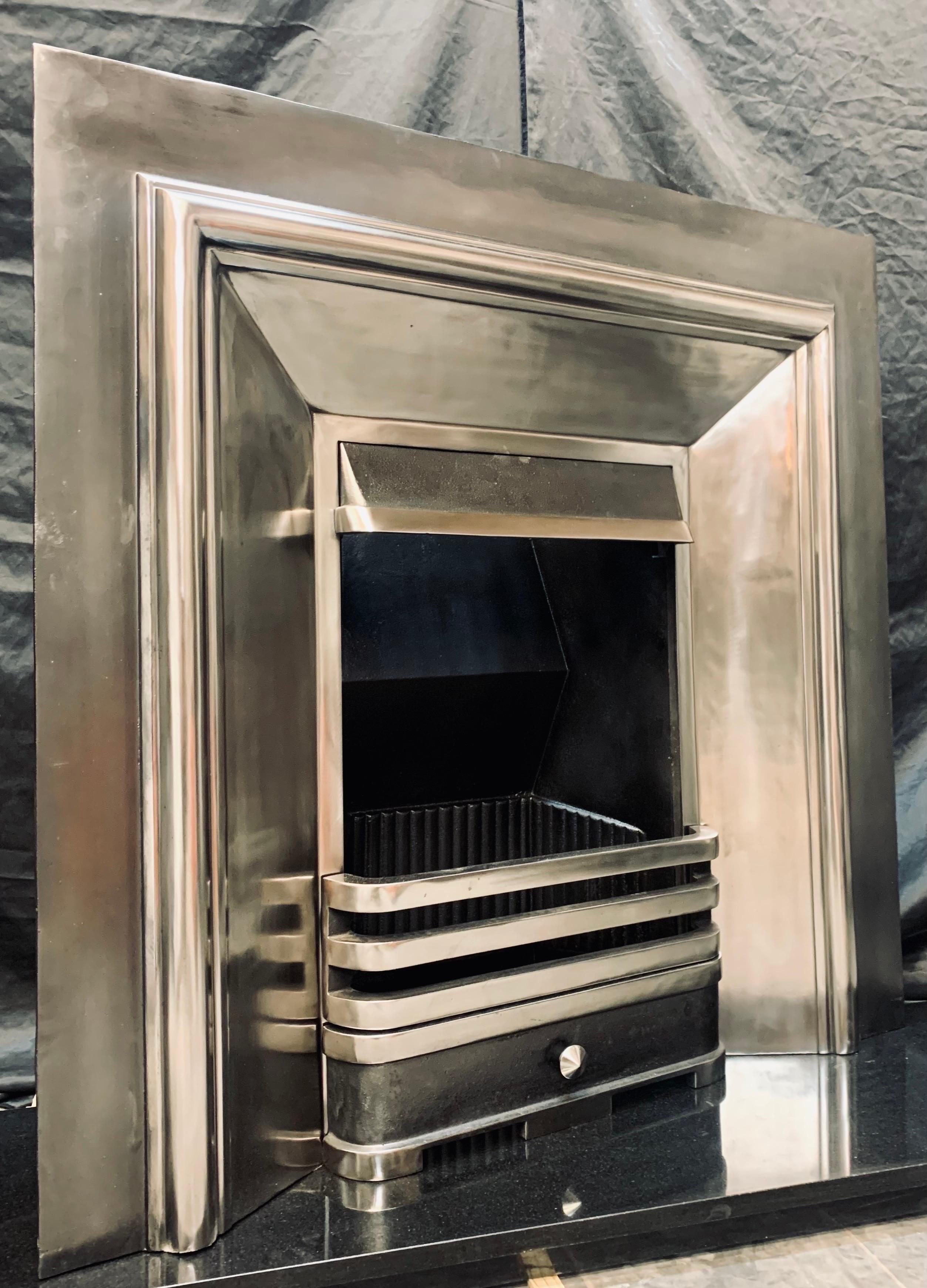 A Victorian Style Polished Cast Iron Splayed Fireplace Insert. 3