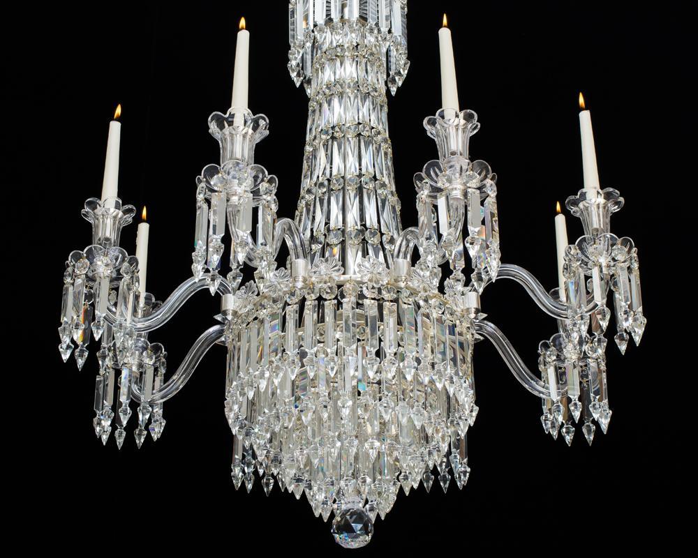 A fine quality early Victorian eight-light cut glass and silvered mounted chandelier of classic tent and waterfall design the stem consisting of chains of buckle tent pieces and spangles, above with drop hung dish terminating with a trumpet shaped