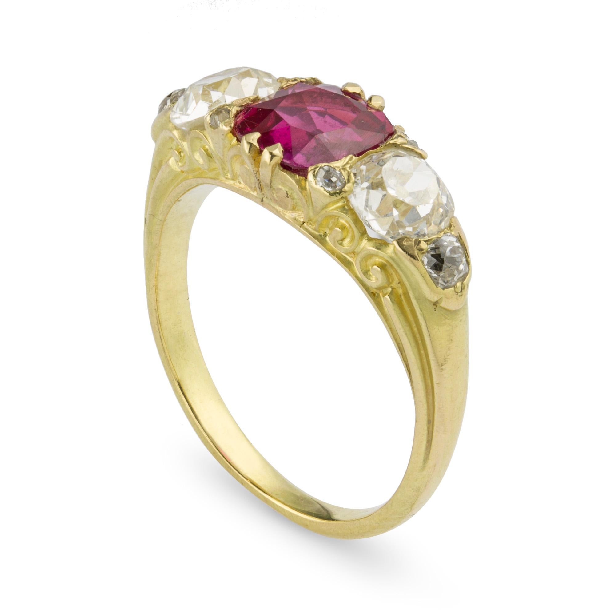 A Victorian three stone ruby and diamond ring, the ruby weighing 1.53 carats,  accompanied by GCS report number 79185-47 stating the ruby to of Burmese origin, with no indication of heating, set between two old brilliant-cut diamonds with an
