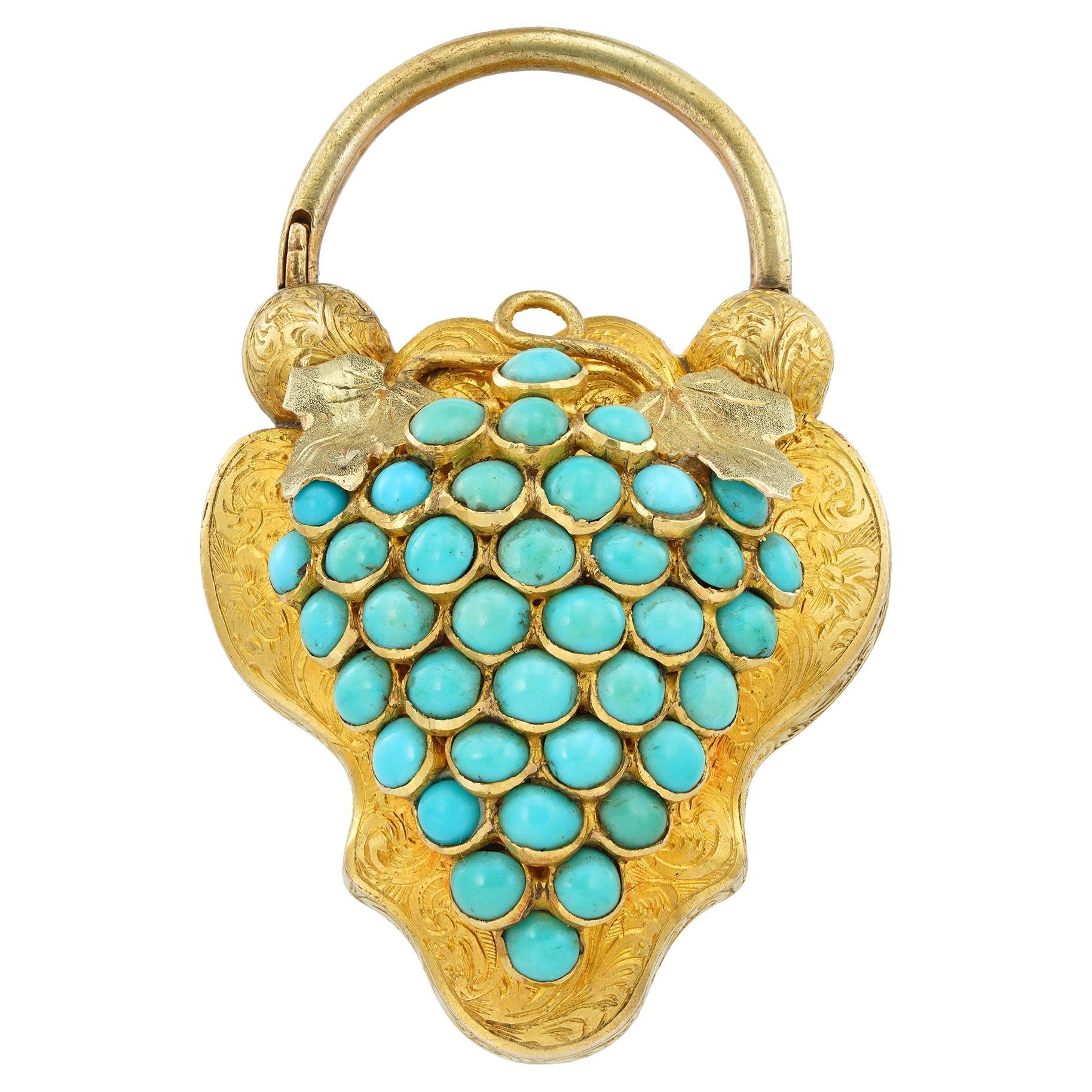 A Victorian turquoise and gold locket pendant