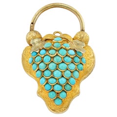 A Victorian turquoise and gold locket pendant