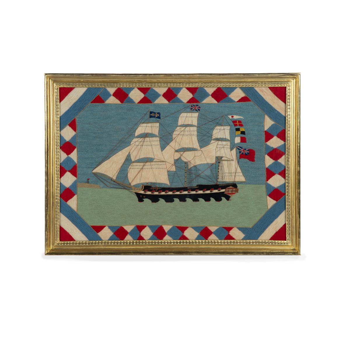 A Victorian wool picture of a three masted frigate flying several flags and ensigns, within a border of red, blue and white trellis, in the original frame, regilded.  English, circa 1860

Footnote:  The flags are rather inaccurate and were probably