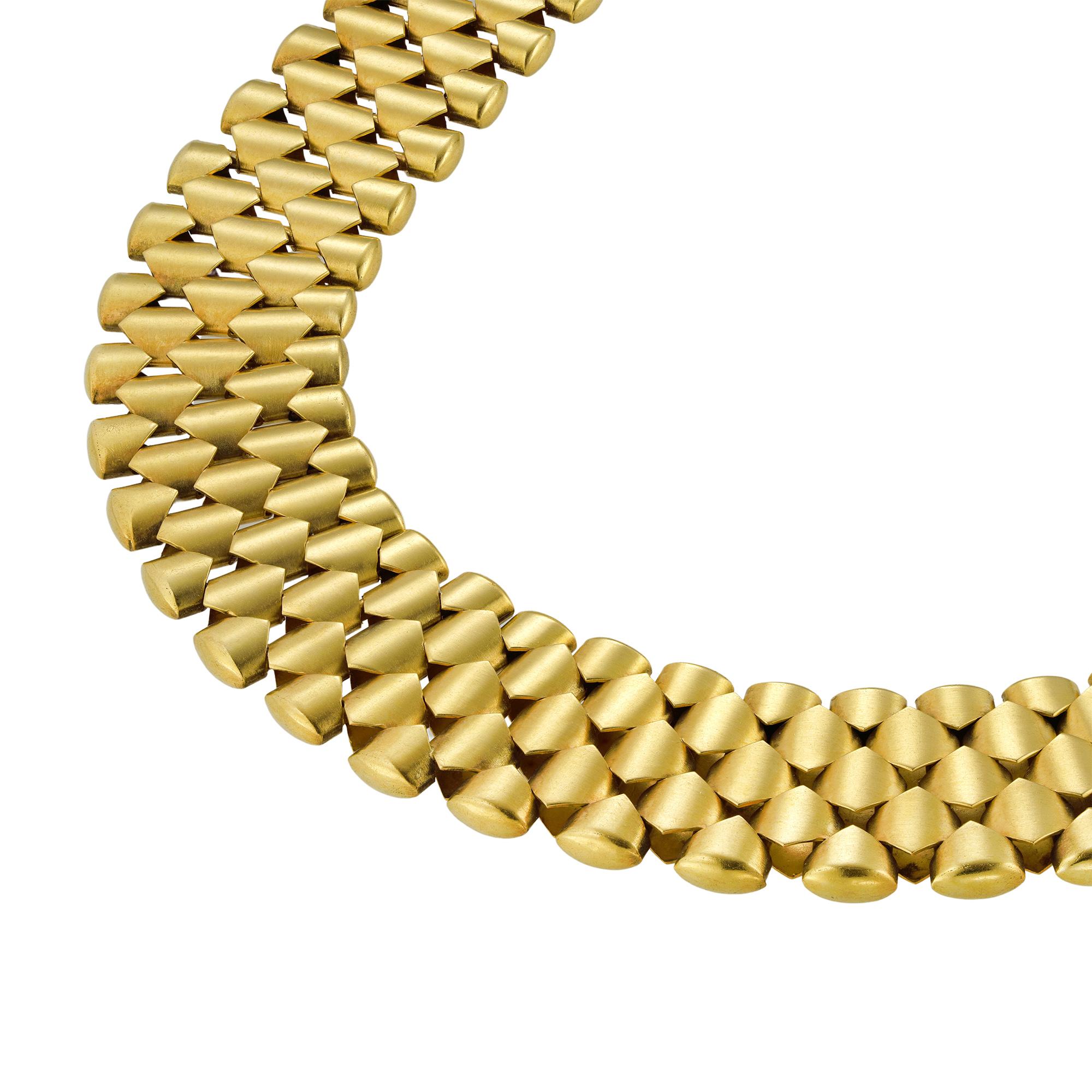 A Victorian yellow gold collar necklace, with interlocking links in diamond pattern, made in yellow gold with hidden clasp, circa 1870, unmarked, tested as 15ct gold, measuring approximately 43 x 1.7cm, gross weight 66 grams.

This antique necklace