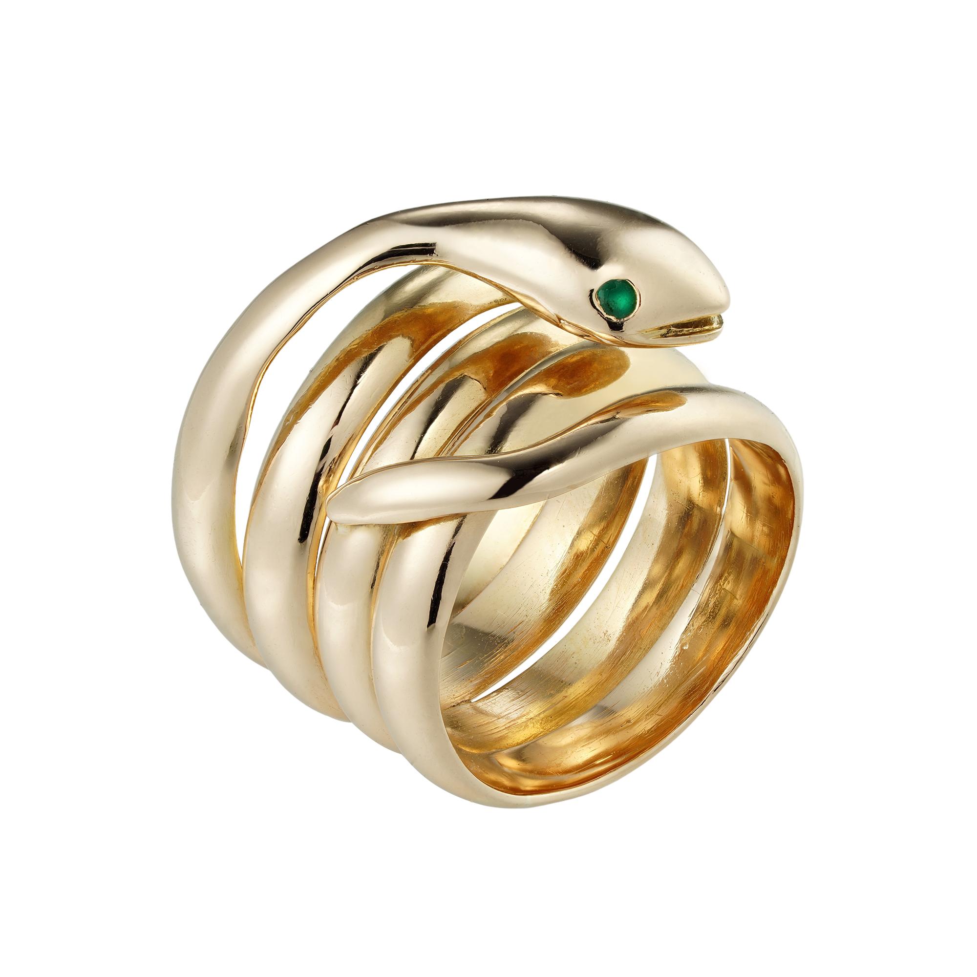 A Victorian yellow gold serpent ring, the ring in the form of a coiled snake, the eyes set with two round faceted emeralds, all made in yellow gold testing as 18ct, bearing French import mark circa 1890, width 1.4 to 1.7cm, finger size G ½, gross