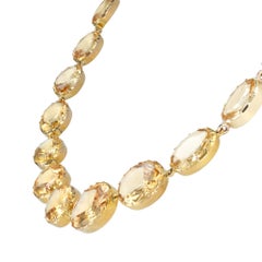 A Victorian yellow topaz riviere necklace