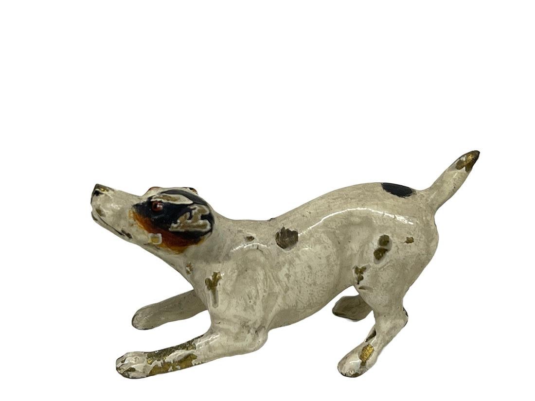 A Viennese bronze miniature cold-painted dog figurine

A bronze miniature dog figurine. Cold painted bronze, signed and numbered on the belly. 
The Viennese bronze cold paint, which shows signs of use, probably dates from around 1900

Measures: