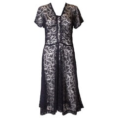 A vintage 1930s -1940s navy blue floral sheer lace / mesh day dress.