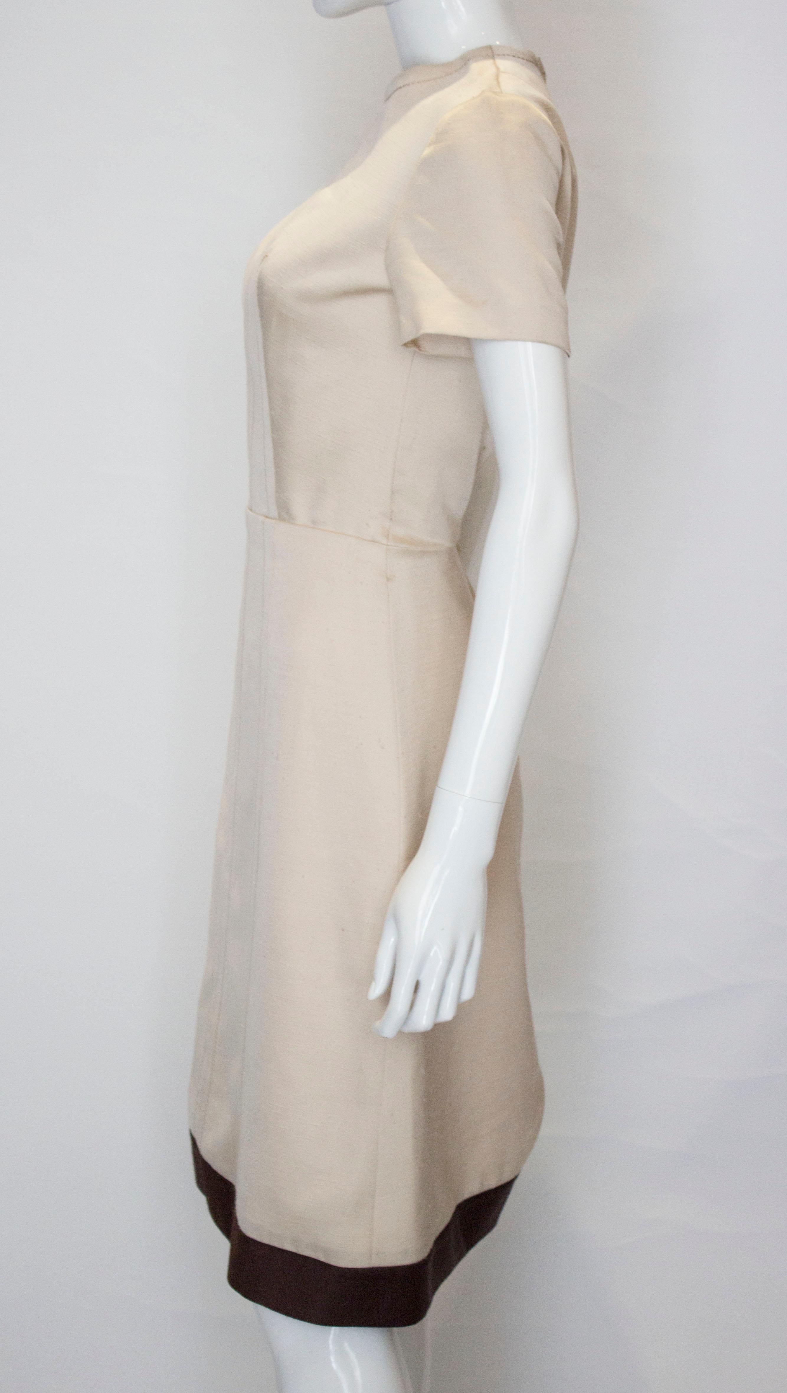 Women's A vintage 1950s - 1960s cream fitted raw silk dress small