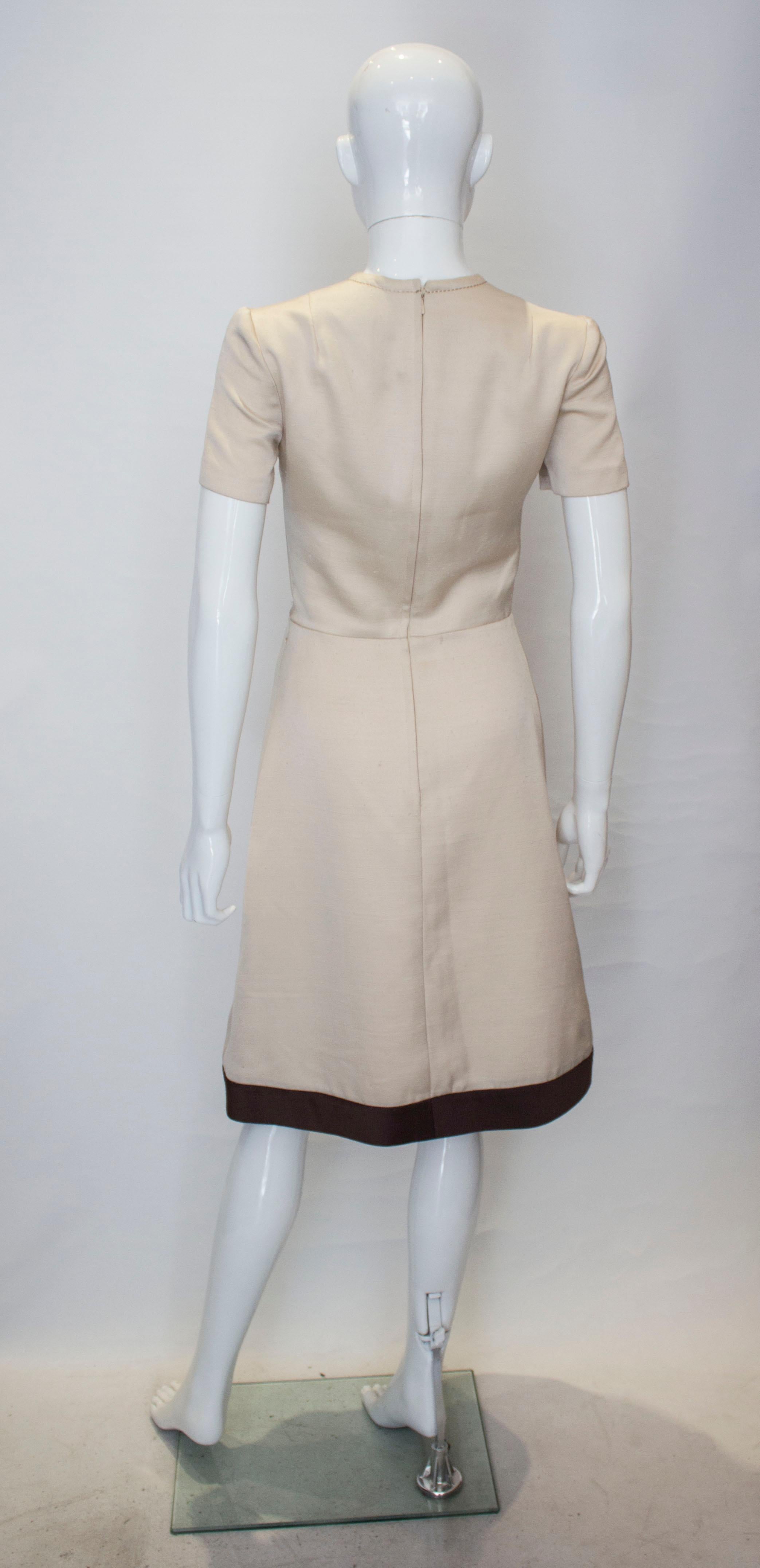 A vintage 1950s - 1960s cream fitted raw silk dress small 1