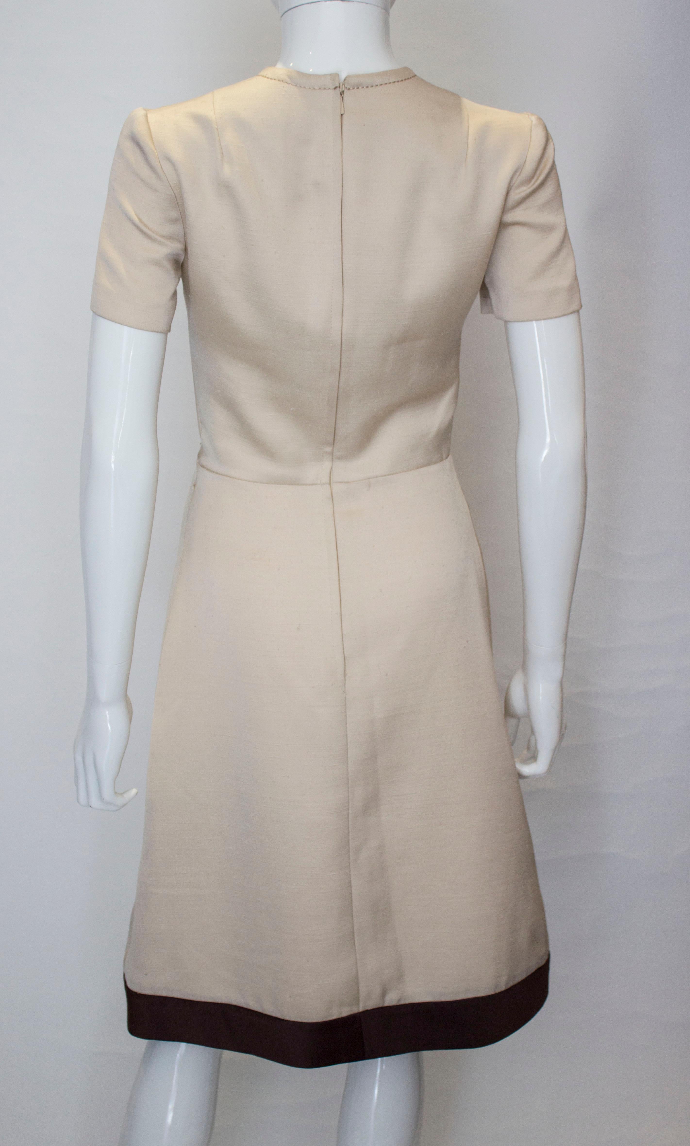 A vintage 1950s - 1960s cream fitted raw silk dress small 2